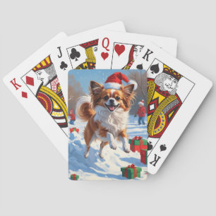 Jeu De Cartes Chien Papillon courant dans la neige avec un chape