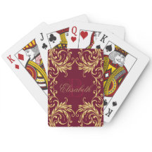 Damassé d'or de monogramme sur rouge foncé