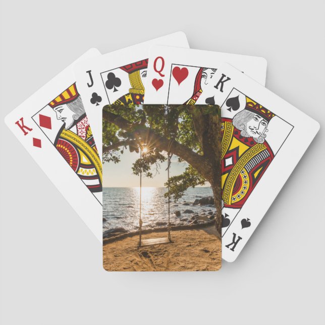 Jeu De Cartes Oscillation sur la plage au coucher du soleil (dos)