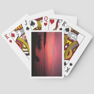 Jeu De Cartes playing cards with a sunset on the back