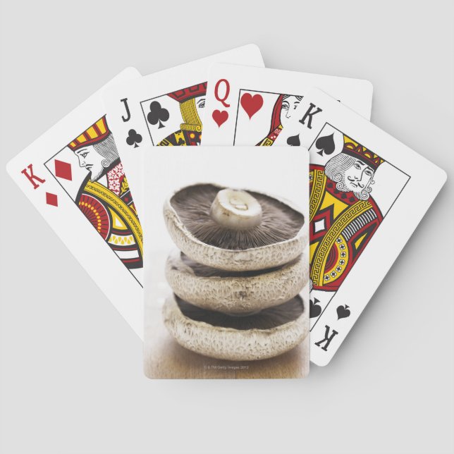 Jeu De Cartes Three flat mushrooms dans pile on wooden board (dos)