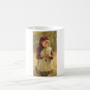 Jeune fille mignonne tenant des fleurs de tasse à