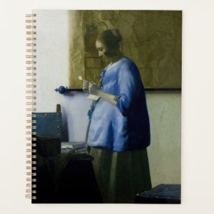 Johannes Vermeer - Une femme en bleu lisant une le