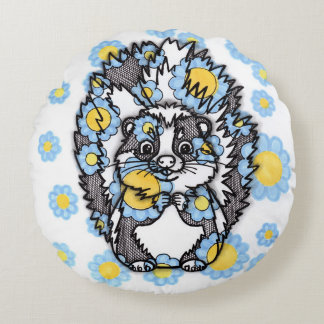 Joli coussin rond de mouffette aux fleurs bleues
