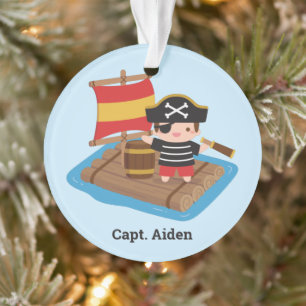 Joli garçon pirate capitaine radeau en bois enfant