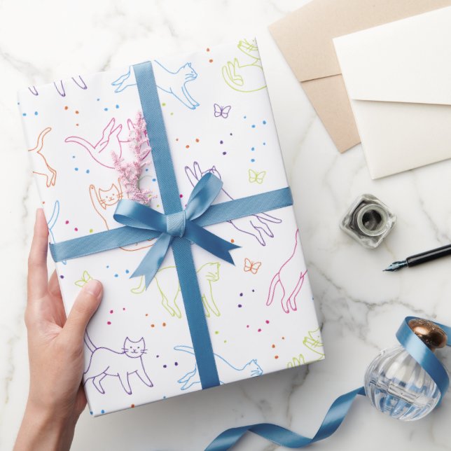 Joli papier cadeau avec des chats dessinés à la ma (Cadeaux)