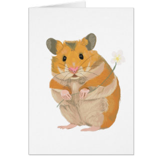 Joli petit Hamster tenant une fleur