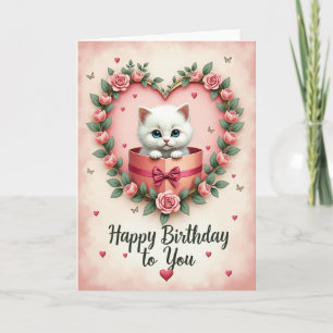 Jolie carte de kitten d'anniversaire dans une cour