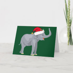Jolie carte de Noël d'éléphant de Noël dans un cha