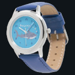 Jolie Cartoon requin bleu bébé Montre débutante<br><div class="desc">Une montre mignonne et amusante pour apprendre à vos enfants comment lire l'heure. Il a l'illustration d'un requin caricaturiste nageant. Les mains sont marquées de minutes et d'heures. Les chiffres à l'intérieur leur disent l'heure et la lunette les aide avec les minutes. Utilisez le modèle pour le personnaliser avec le...</div>