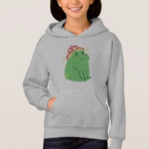 Jolie grenouille verte avec chapeau de champignon