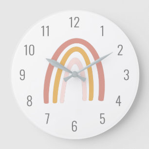 Jolie horloge murale rose pastel arc-en-ciel pour