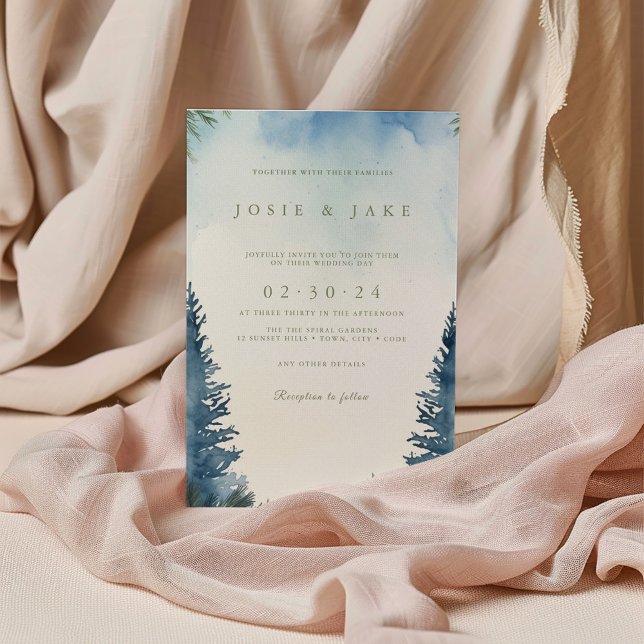 Jolie pinède d'hiver faire-part de mariage verte (Blue watercolor forest wedding invitation with pine tree border and elegant typography.)