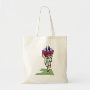 Joueur De Football Avec Le Sac fourre-tout Ball