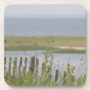 Jour d'été doux aux dessous de verre de plage