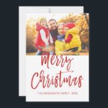 Joyeux Carte photo de script lettres main Noël<br><div class="desc">Joyeux Noël Carte photo de script lettres main. La photo et le texte de ce script de brosse manuscrite peuvent être mis à jour et customisés avec votre photo et votre nom de famille. Cette carte affiche également le nom de famille et une feuille d'or au dos de la carte...</div>