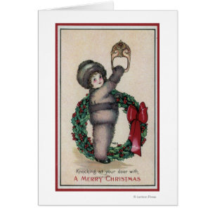 Joyeux ChristmasKid frappant avec une guirlande