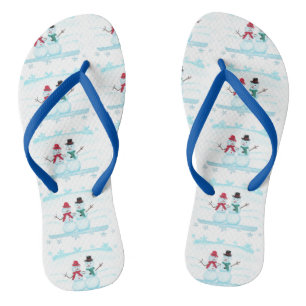 Joyeux Couple de neige brandissant des tongs de No