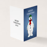 Joyeux et heureux Snowman<br><div class="desc">Le joyeux bonhomme de neige portant un casquette vert et un foulard rouge est prêt pour Noël.</div>
