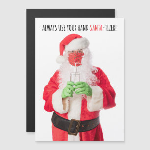 Joyeux Père Noël de Noël dans le masque Sanitizer 