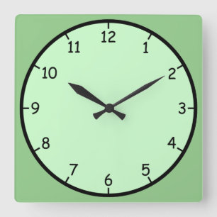 Juste une horloge murale verte amusante et colorée