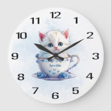 Kitten en Coupe Fleurs Bleues Horloge murale