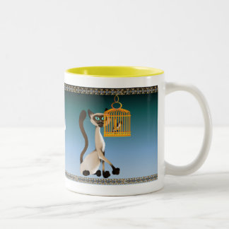 Kitty et tasse d'oiseau