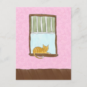 Kitty jaune dans une carte postale fenêtre