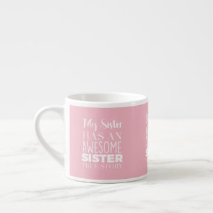 La belle tasse rose avec les soeurs drôles