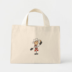 La Chef Girl avec des sacs à cuillère en bois
