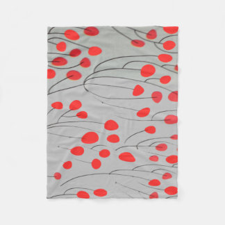 La couverture polaire DOTS rouge