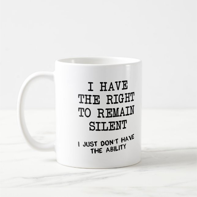 La droite à demeurent tasse drôle silencieuse (Gauche)