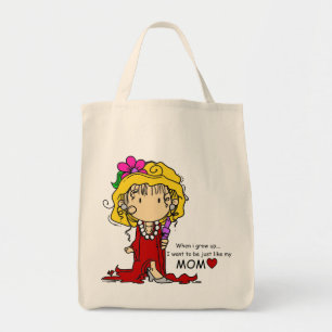 La fille aiment juste le sac fourre-tout à maman