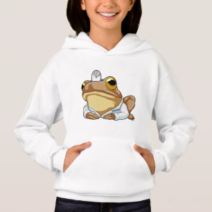 La grenouille comme docteur avec le manteau du doc