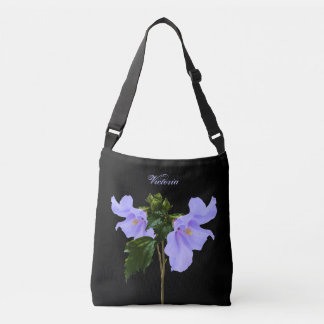La ketmie bleue fleurit les sacs fourre-tout noirs