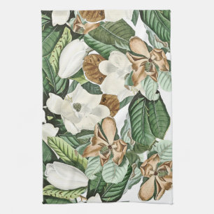 La magnolia blanche d'or fleurit la serviette de