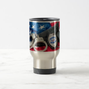 LA POLICE "PROTÈGE ET SERT" LA TASSE DE VOYAGE