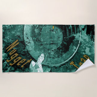 La serviette de plage du piège à nugget doré