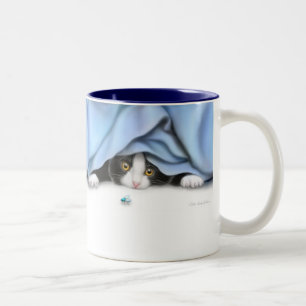 La tasse de jouet de chat de vol