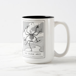 La tasse foncée d'arts