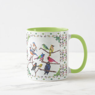 La tasse modelée par oiseaux chanteurs colorés de