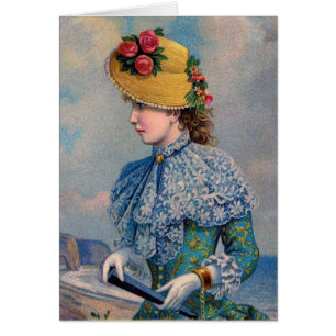La Vintage dame en bleu au bord de la mer,