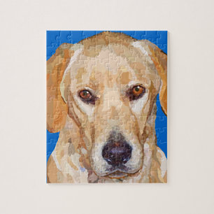 Labrador retriever peignant le puzzle
