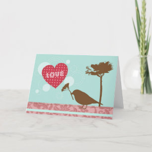 L'amour est dans la carte de voeux d'oiseau d'air