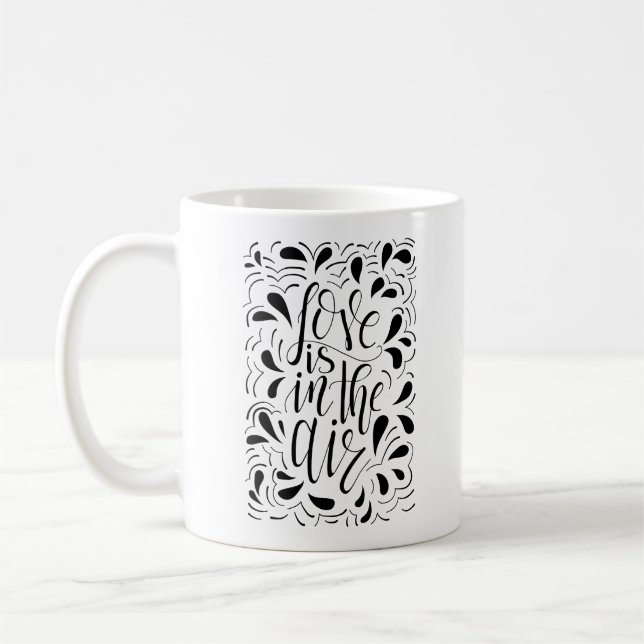 L'Amour Est Dans L'Air Mug (Gauche)
