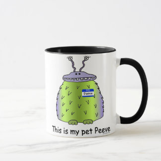 L'animal familier irritent la tasse