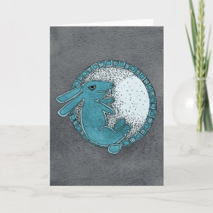 Lapin dans la carte de voeux de lune (bleue)