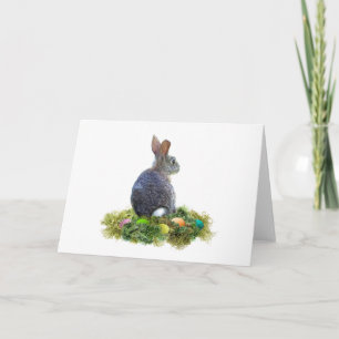 Lapin de coton avec carte d'oeufs colorés