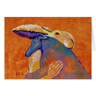 Lapin tenant le chien