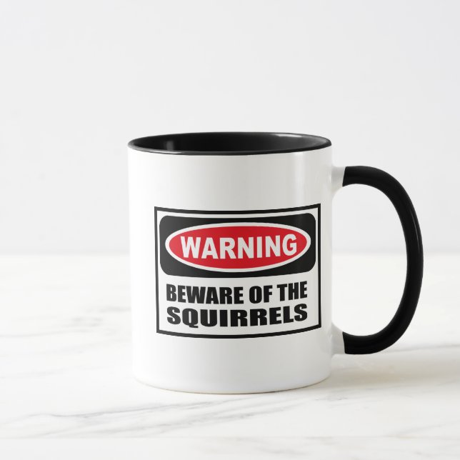 L'avertissement PRENNENT GARDE de la tasse (Droite)